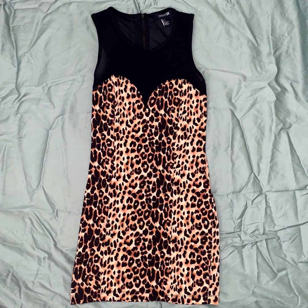 Cheetah Dress that has a black mesh top/back.